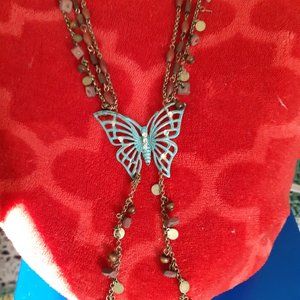 Unique Beaded Baby Blue Butterfly Necklace with Brown Wooden Beads.